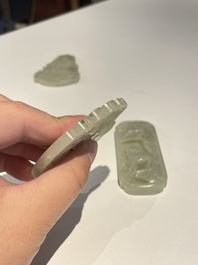 Three Chinese celadon and white jade pendants, Qing