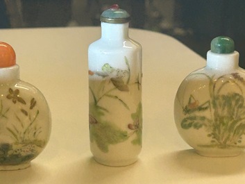 Five Chinese famille rose 'grasshopper' and 'butterfly' snuff bottles, 19/20th C.