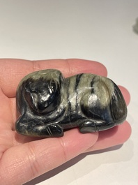 Five Chinese white, celadon and grey-black jade carvings, Qing/Republic