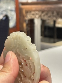 Three Chinese celadon and white jade pendants, Qing