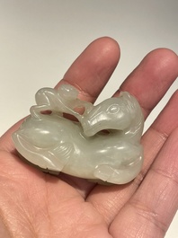 Five Chinese white, celadon and grey-black jade carvings, Qing/Republic