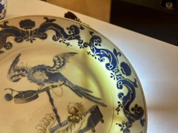 A pair of Chinese eggshell Pronk studio 'parrot and spaniel' plates, Yongzheng/Qianlong
