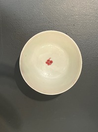 A Chinese famille rose ruby-pink-ground 'pheasants' cup and saucer, Yongzheng