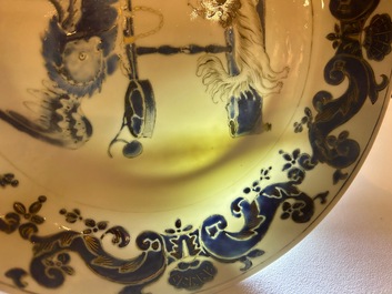 A pair of Chinese eggshell Pronk studio 'parrot and spaniel' plates, Yongzheng/Qianlong