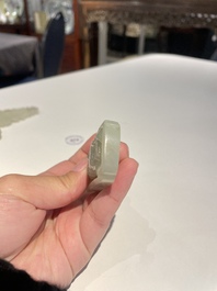 Three Chinese celadon and white jade pendants, Qing