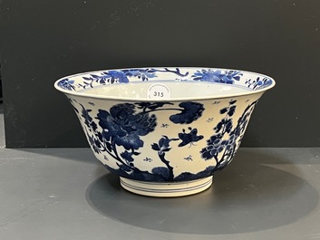 A Chinese blue and white bowl with floral 'four seasons' decoration, Chenghua mark, Kangxi