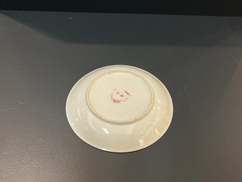 A Chinese famille rose ruby-pink-ground 'pheasants' cup and saucer, Yongzheng