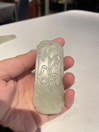 Three Chinese celadon and white jade pendants, Qing