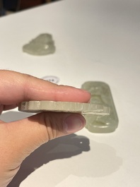 Three Chinese celadon and white jade pendants, Qing