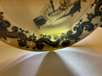 A pair of Chinese eggshell Pronk studio 'parrot and spaniel' plates, Yongzheng/Qianlong