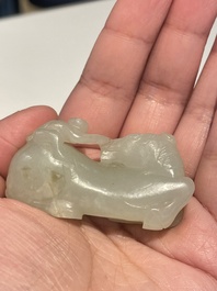 Five Chinese white, celadon and grey-black jade carvings, Qing/Republic