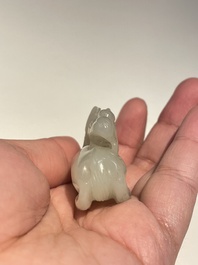Five Chinese white, celadon and grey-black jade carvings, Qing/Republic