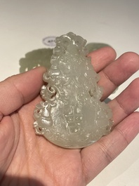 Three Chinese celadon and white jade pendants, Qing