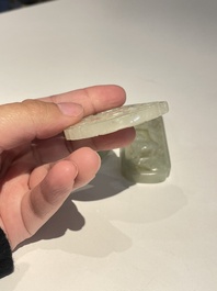 Three Chinese celadon and white jade pendants, Qing