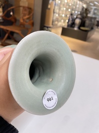 Een Chinese Longquan celadon vaas met pioenslingers, Yuan