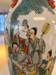 A Chinese qianjiang cai vase with musicians and scholars, signed Zhou Ding 周鼎, dated 1915