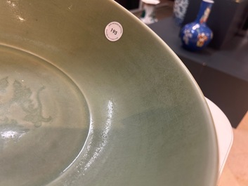 A Chinese Longquan celadon bowl with underglaze floral design, Ming