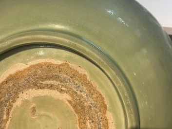 A Chinese Longquan celadon bowl with underglaze floral design, Ming