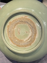 A Chinese Longquan celadon bowl with underglaze floral design, Ming