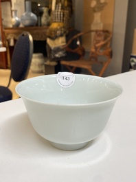A Chinese white-glazed bowl, Jiaqing mark and probably of the period