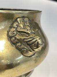 A Chinese bronze elephant-head-handled censer, Xuande mark, Kangxi/Qianlong