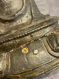 A Chinese gilt bronze standing Buddha, Ming