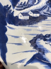 A Chinese blue and white dish with a scholar in a landscape, Yongzheng/Qianlong