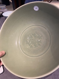 A Chinese Longquan celadon bowl with underglaze floral design, Ming