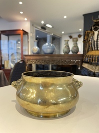 A Chinese bronze elephant-head-handled censer, Xuande mark, Kangxi/Qianlong