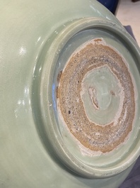 A Chinese Longquan celadon bowl with underglaze floral design, Ming