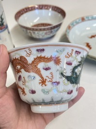 A Chinese famille rose brush pot, two plates and two bowls, 19/20th C.