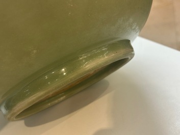 A Chinese Longquan celadon bowl with underglaze floral design, Ming