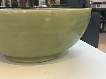 A Chinese Longquan celadon bowl with underglaze floral design, Ming