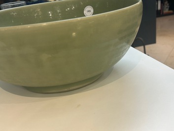 A Chinese Longquan celadon bowl with underglaze floral design, Ming