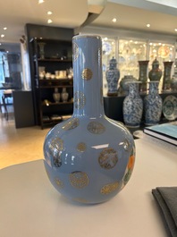 A Chinese lavender blue-ground bottle vase with fruit medallions, Republic