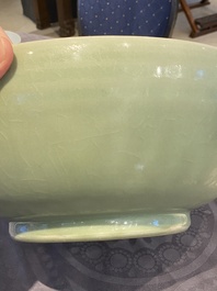 A Chinese Longquan celadon bowl with underglaze floral design, Ming