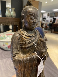 A Chinese gilt bronze standing Buddha, Ming