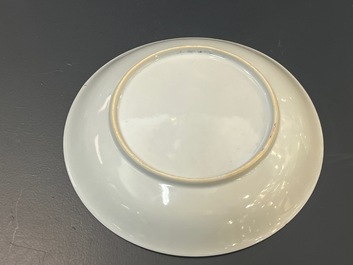 A Chinese famille rose plate and bowl with a nursing mother and men drinking tea on the shore, Yongzheng