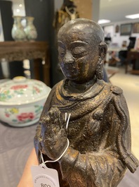 A Chinese gilt bronze standing Buddha, Ming