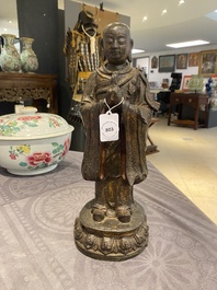 A Chinese gilt bronze standing Buddha, Ming