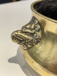 A Chinese bronze elephant-head-handled censer, Xuande mark, Kangxi/Qianlong