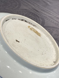 A Chinese blue and white dish with a scholar in a landscape, Yongzheng/Qianlong