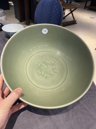 A Chinese Longquan celadon bowl with underglaze floral design, Ming