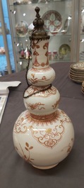 A Chinese iron-red and gilt-decorated triple gourd vase, Kangxi