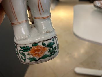 A pair of Chinese famille verte 'Hehe Er Xian' figures, Kangxi
