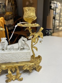 A Chinese Dehua blanc de Chine joss stick holder with French gilt bronze candlestick mounts, Kangxi and 18/19th C.