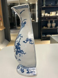 A pair of Chinese blue and white wall pocket vases with antiquities, Kangxi