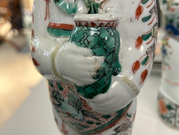 A pair of Chinese famille verte 'Hehe Er Xian' figures, Kangxi