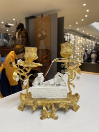 A Chinese Dehua blanc de Chine joss stick holder with French gilt bronze candlestick mounts, Kangxi and 18/19th C.