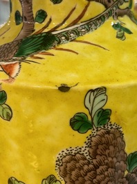 A pair of Chinese yellow-ground famille verte rouleau vases, 19th C.